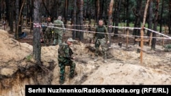 Под Изюмом нашли массовые захоронения людей и солдат ВСУ, 15 сентября 2022 года